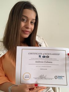 Andreea Ciobanu, winner of the 2022 ITN Scholarship Competition holding her Certificate. She is set to enjoy her USA internship with all $3,825 covered.